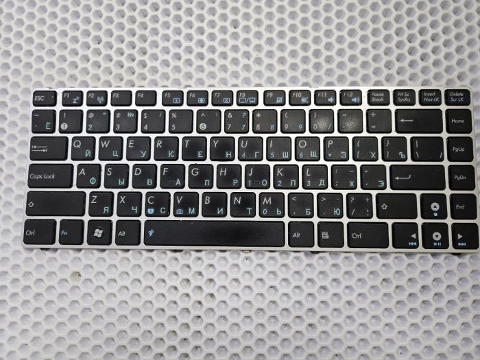 Клавиатура для ноутбука Asus A42, K42, UL30 с серебристой рамкой
